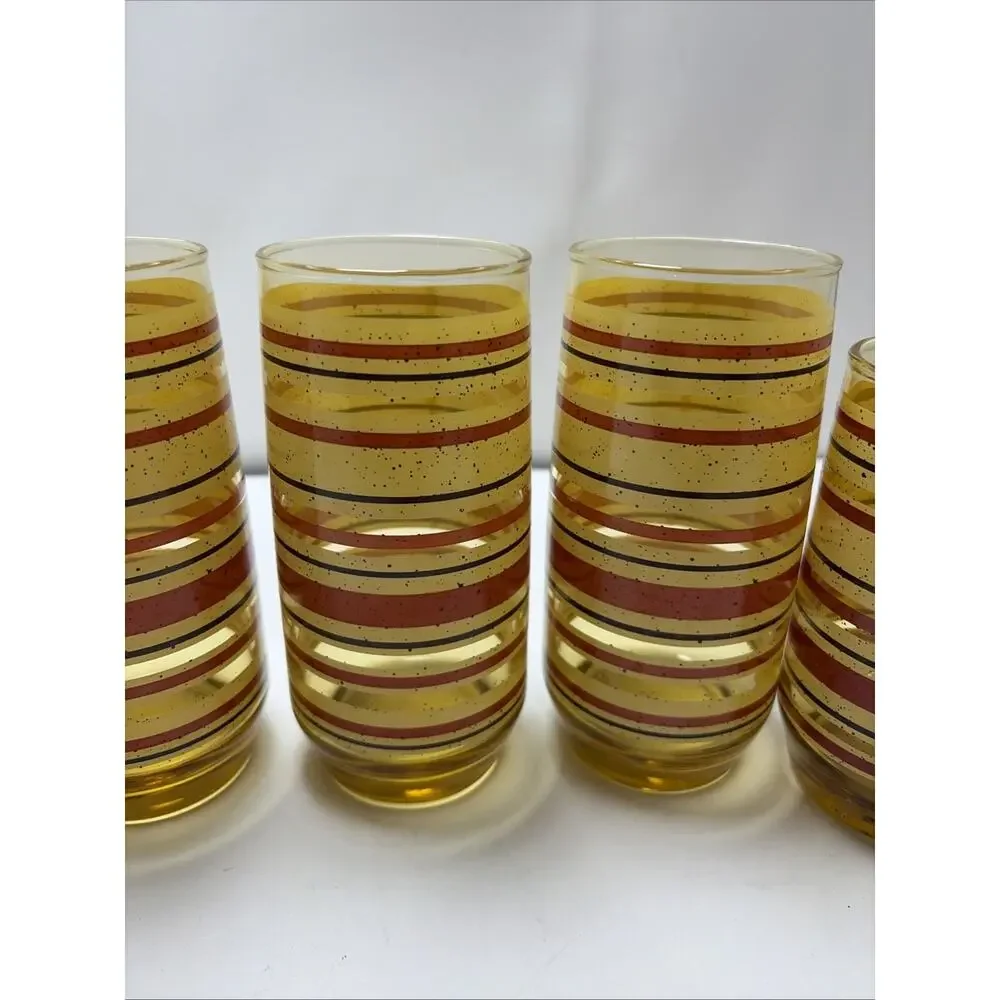 Mid Century Modern amber glass juice tumblers yellow red stripe speckled Anchor